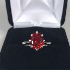 Gorgeous Padparadscha Sapphire Ring * 3ct Oval Cut Orange Padparadscha Sapphire measures 10mm x 8mm * Beautiful 8 Prong Woven Crown Setting * Solid Sterling Silver * Sized to Order - 4 to 10 - Select your size Hallmarked & Gift Ready! This Sapphire is Laboratory Grown & is identical to natural in every way, including Chemistry, Composition & Hardness with Excellent Clarity & Color Refraction. TIMELESS, BEAUTIFUL & UNIQUE FINE ART JEWELRY This Ring is Made & Custom Sized t Lab-created Ruby Diamond Ring For Anniversary, Classic Red Jewelry With Round Cut, Solitaire Ruby Ring With Cubic Zirconia For Wedding, Classic Ruby Jewelry For Proposal, Red Oval Solitaire Diamond Ring, Ruby Ring With Round Cut For Anniversary, Ruby Ring With Center Stone For Wedding, Red Solitaire Jewelry For Formal Occasions, Red Brilliant Cut Rings