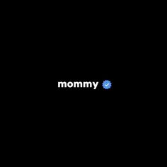 the word mommy is written in white on a black background with an image of a blue smiley face