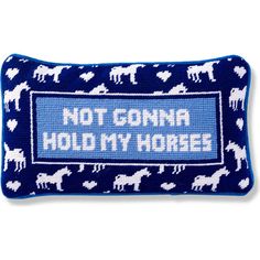 a blue pillow with white horses on it that says, not gonna hod my horse