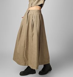 "Winter Maxi skirt for women, Warm Button-down skirt, Long skirt, Custom made, Made to order, Plus size -Model height: 5'7\" wearing size S -Length: 38\" -Fit: A-line -Closure: Front button and zipper" Fitted Cargo Skirt With Button Closure, Fitted Cargo Skirt With Button Closure For Spring, Spring Flared Skirt With Button Closure, Long Skirt With Button Closure For Spring, Spring Long Skirt With Buttons, Flared Skirt With Button Closure For Spring, Flared Skirt Bottoms With Button Closure For Spring, Beige Relaxed Skirt With Button Closure, Beige Buttoned Long Skirt