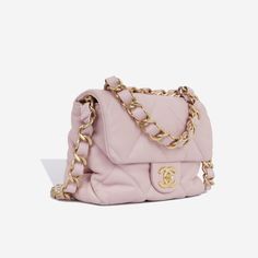 This is a unique seasonal piece takes inspiration from the Chanel 19 bag, replicating the soft supple shape and large diamond quilting, yet with a traditional CC closure. Crafted in goatskin leather and an enlarged chain/leather strap, this little bag is compact and classic. SPL Exterior Baby pink goatskin leather Champagne gold hardware Chunky chain/leather top handle Chunky chain/leather shoulder strap CC twist closure Plaque series Good condition - visible rubbing/darkening to the corners and flap corners. Tarnishing to the closure hardware. Interior Pink fabric interior Two compartments Chanel embossed logo One zip pocket Great condition - some light marks inside and under the flap Sold with box and dustbag SPL Height 16cm Width 20cm Depth 6cm Champagne Gold Hardware, Chanel 19 Bag, Chanel 19, Timeless Handbag, Luxe Fashion, Champagne Gold, Leather Chain, Pink Fabric, Exclusive Bag