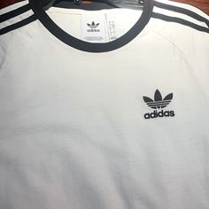 Brand New Without Tags, Perfect White Condition Classic Adidas Cotton Tops, Classic White Top With Three Stripes, Classic White Tops With Three Stripes, White Casual Adidas Shirt, Casual White Adidas Shirt, Adidas White, Adidas Shirt, White Adidas, Adidas Men