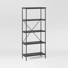 a metal shelf with three shelves on each side and one shelf below it, against a white background