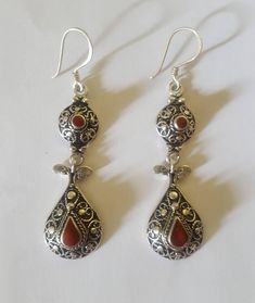 Morocco - Pair of Moorish silver earrings Height: 7 cm Width: 1,8 cm Weight (Gr.): 16 grams Feel free to contact me for any question about this item, I will be happy to answer you as soon as possible. Moorish Jewelry, Cottagecore Things, Mine Mine, Ear Jacket, Jewelry Lookbook, Red Earrings, Morocco, Silver Earrings, Etsy Accessories