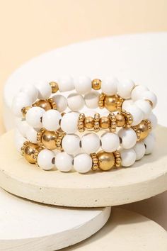 White and Gold Stacked Bracelet Set White Metal Pearl Bracelet With Jubilee Details, White Metal Pearl Bangle Bracelet, White Metal Pearl Bracelet With Round Beads, Adjustable White Round Chain Bracelet, White Metal Bracelets With Round Beads, Adjustable White Chain Bracelet With Extender, Trendy White Bangle Chain Bracelet, Trendy White Round Pearl Bracelet, White Beaded Metal Bracelet