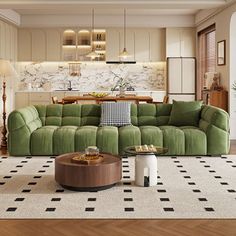 a living room filled with furniture and a large green couch