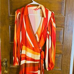 Nwot Beautiful Flying Tomato Wrap Dress. Cream Red Orange And Gold Colors. Size M Hits Below The Knee. So Comfortable And Versatile Makes It Perfect For Any Occasion. Retro Red Long Sleeve Mini Dress, Red Long Sleeve Wrap Dress For Spring, Red Spring Midi Length Wrap Dress, Red Midi Length Spring Wrap Dress, Red Midi Length Wrap Dress For Spring, Flying Tomato Dress, Dresses Beautiful, Orange And Gold, Flying Tomato