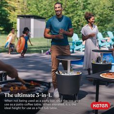 a man standing in front of a bbq with pizza on it and people sitting around