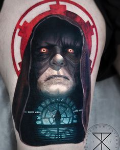 a man with a star wars tattoo on his leg and the face of darth vader