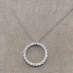 This Is A Fine Round Diamond Halo Open Circle Lady's Necklace Pendant. It Is Made Of 100% Natural 18kt White Gold And Is In Brand New Condition. It Has A Ctw Of .80ct And Weighs 4.1 Grams. The Fancy Diamonds Have A Clarity Of Si1 And F Color. This Beautiful Custom Piece Has Excellent Round Cut Diamond Stones That Form A Cluster Pattern On This Beautiful Lady's Pendant. Samson Diamond 100% Authentic Natural Diamonds, Gemstones, And Gold. Never Lab Created/Synthetic/Fake Merchandise. Round Diamond Halo, Open Circle Necklace, Fancy Diamonds, Circle Necklace, Diamond Halo, Diamond Stone, Round Cut Diamond, Halo Diamond, Luxury Items