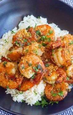 a plate with shrimp and rice on it