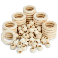 several wooden beads are stacked on top of each other and one is in the middle