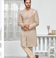 This is a premium sherwani Indo Western  by Groom Wear Studio crafted from high quality fabric and imported materials. Our products are handcrafted by experienced tailors who make sure the that the stitching is precise, lining is proper and the overall product is sturdy enough to not go out of shape for more than a few years. Also all our products have extra margins in their length, sleeves, sides so it's easily alterable if your size changes after some time. To see more available colours and de Groom Outfit Indian, Reception Dress Groom, Indo Western Men, Engagement Dress For Men, Western Men, Outfit Indian, Groom Sherwani, Sherwani Groom, Groom Wedding Dress