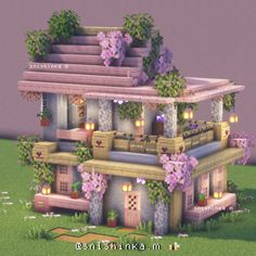 a very cute house with flowers on the roof and stairs to the second floor that is made out of wood