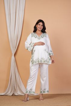 Hand Embroidery Cotton Satin Lounge Wear Set, Floral Maternity Pj Set, Pregnancy Top And Pajama Set, Maternity Loungewear Baby Shower Gift Printed Top And Pajama Set. Pants have Elastic for Comfort Fit. 100% Cotton Satin Fabric. Top Size -XS, S, M, L, XL, 2XL, 3XL, 4XL. Pant Size -XS, S, M, L, XL, 2XL, 3XL, 4XL. Package Contents -1 Top 1 Pant. Embroidery Cotton Satin Print Fabric.  Customizations Can be Done.  Wash Care :  Do Not Soak or Tumble Dry. Cold Water Wash Using Mild Detergent. Dry in S White Pant Set With Chikankari Embroidery For Wedding, Festive White Pant Set With Floral Embroidery, White Chikankari Embroidered Pant Set For Wedding, White Floral Embroidered Long Sleeve Palazzo Set, White Long Sleeve Palazzo Set With Floral Embroidery, White Pant Set With Resham Embroidery For Wedding, White Cotton Sleepwear With Floral Embroidery, Embroidered Long Sleeve Loungewear Sets, White Pant Set With Resham Embroidery And Long Sleeve