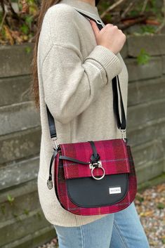 A Fall colored plaid bag with a sophisticated look. Made in Ireland with premium materials and carefully created with 200 year old looms, this bag will bring your look style and class. Has a zipper, hand strap, crossbody strap, and spacious inside for your purse essentials. Made with 100% Wool & PU Leather Length: 9", Width: 3.5", Height 8.5" Plaid Bags With Adjustable Strap, Plaid Bags With Adjustable Strap For Everyday Use, Plaid Satchel Shoulder Bag For Travel, Plaid Bag With Adjustable Strap For Daily Use, Everyday Plaid Bag With Adjustable Strap, Plaid Satchel Bag For Everyday Use, Plaid Shoulder Bag With Adjustable Strap For Daily Use, Plaid Rectangular Shoulder Bag With Adjustable Strap, Plaid Satchel Bag For Daily Use