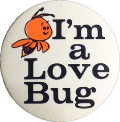 i'm a love bug button with an orange and black cartoon character on it