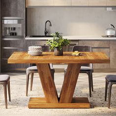 a wooden table with chairs around it in a modern style kitchen and dining room area