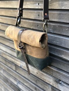 This day bag / satchel is your perfect companion for the days when you only need some necessities to take with you. The day bag is made in heavy weight waxed canvas in the color spice and forest green , with roll to close top, with snap and strap closing. Made it with a double layered bottom, for extra durability and strength. (in forest green waxed canvas ) Phone pocket on the backside closing with pouch button. With adjustable and detachable shoulder strap in vegetable tanned leather Fully lin Canvas Satchel Bag For Adventure, Canvas Satchel For Adventure, Rectangular Canvas Satchel For Everyday Carry, Rectangular Canvas Satchel For Everyday Use, Canvas Satchel Shoulder Bag For Adventure, Adventure Canvas Satchel Shoulder Bag, Practical Waxed Canvas Satchel Shoulder Bag, Brown Waxed Canvas Bag For Everyday Carry, Practical Waxed Canvas Shoulder Bag With Adjustable Strap