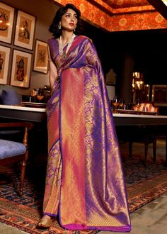 ROYAL PURPLE AND RED DUAL TONE KANJIVARAM SILK 144004  Desc:      Elegancy and Simplicity of  this Kanjivaram saree easily attract eyes. With exquisite design spread across the length of the saree it is perfect for any occasion.Saree length : 5.5 meterBlouse piece :  0.8 meterFabric : Blended silk. With Express Free Shipping and Custom Stitching, Buy Indian Party wedding wear Kanchipuram Silk Saree ROYAL PURPLE AND RED DUAL TONE KANJIVARAM SILK 144004 online in USA, UK and Canada from KollyBolly Botas Outfit, Cocktail Dresses Wedding, Indian Wedding Sarees, Purple Weave, Kanjivaram Sarees Silk, Designer Sarees For Wedding, Purple Saree, Indian Designer Sarees, Sarees For Wedding