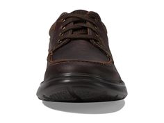 Take your casual look to the next level with the Clarks® Cotrell Edge lace-up oxford! Made of leather with stitch details and textile lining..Pull on lace-up construction with a round-toe silhouette..Cushioned Ortholite® footbed..Synthetic outsole..Imported..Product measurements were taken using size 7, width D - Medium. Please note that measurements may vary by size..Measurements: Weight: 8.2 oz Plain Toe Oxfords With Lace-up Fastening For Derby, Plain Toe Oxfords With Front Lace-up For Derby, Casual Oxfords With Rubber Sole, Casual Brown Lace-up Shoes For Work, Casual Brogue Lace-up Shoes For Work, Casual Lace-up Shoes With Brogue Detailing For Work, Casual Low-top Oxfords For Work, Casual Oxford Shoes For Work, Casual Oxford Lace-up Shoes For Derby