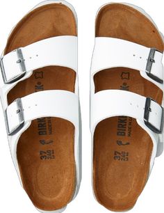 Classic Footbed Sandals With Tang Buckle And Round Toe, White Double Strap Classic Sandals, Classic White Double Strap Sandals, Classic Footbed Sandals With Buckle Closure, Classic Footbed Sandals With Double Strap And Adjustable Fit, Classic Adjustable Slides With Leather Footbed, Classic Slides With Buckle Closure, Classic Adjustable Slip-on Footbed Sandals, Classic Beach Slides With Buckle Closure