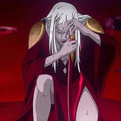 an anime character with white hair sitting on the ground in front of a red background