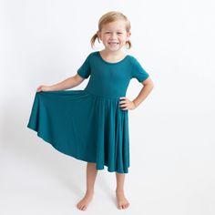 Cut from soft, stretchy bamboo fabric, this twirl dress features a full skirt so your toddler can spin in style. The classic design of the dress can easily be dressed up or down, making it the perfect everyday outfit. 97% Rayon made from Bamboo, 3% Spandex 240 gsm creates a flattering drape Ballerina neckline Toddler Bag, Twirl Dress, Everyday Outfit, Bamboo Fabric, Full Skirt, Socks Women, Everyday Outfits, In Style, Classic Design