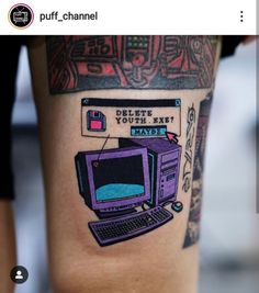 a person with a computer tattoo on their leg