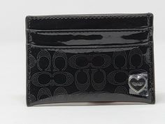 Coach Perforated Embossed Liquid Black Gloss Card Case Wallet F62405 Style: F62405 Color: Black/Silver Style: F62405 Embossed patent fabric Credit card and multifunction pockets Measurements: 4" (L) x 2 3/4" (H) Gift Receipt is available upon request Imported Guaranteed 100% Authentic By law we must declare that we are not affiliated with Coach nor are we an authorized agent of Coach.  The handbags, wallets, and other items pictured & described are the actual items you will receive. They are bra Black Liquid, Winter Closet, Card Case Wallet, Black Gloss, Pearl Leather, Black Card, Coach Wallet, Department Stores, Silver Style