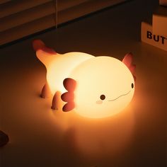 a cat shaped light sitting on top of a table