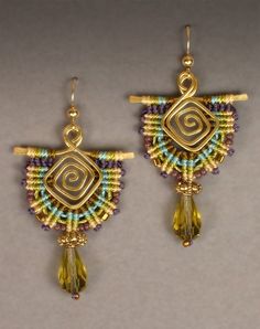 the earrings are made with beads and gold