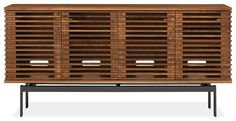 the sideboard is made out of wood and has shutters on each side, along with metal legs