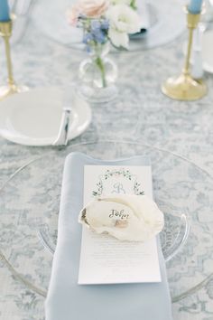 the table is set with silverware and place settings for an elegant wedding breakfasteon