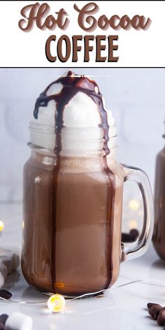 hot cocoa coffee in a mason jar with whipped cream on top