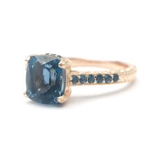 It is an heirloom quality engagement ring that is sure to become a precious family heirloom. This is a limited edition Alpha Jewelry original. Order now to guarantee availability. Follow our etsy shop become our members can get new tips on products on time and also get 10% off on new products. https://www.etsy.com/shop/AlphaJewelryCompany Blue Rings With Rose Cut Diamonds For Promise, Blue Rose Cut Diamond Promise Ring, Blue Topaz Diamond Promise Ring, Luxury Blue Topaz Ring With Rose Cut Diamonds, Formal Blue Rings With Rose Cut Diamonds, Blue Topaz Gemstone Ring For Promise, Classic Blue Topaz Diamond Ring, Blue Rose Cut Diamond Rings, Heirloom Blue Birthstone Ring For Promise