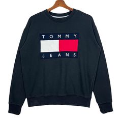 Tommy Jeans Embroidery Big Logo US Designer Luxury Brand Crewneck Sweatshirt Jumper Black Size Medium * Made in : Turkey * Size on Tag : Extra Small (XS) * Manual Measurement (inch) : Chest 23, Length 25, Shoulder 21, Sleeve 21.5, Hem 17. * Recommended for Size : Medium (M) * Material : Cotton * Colour : Black  * Condition : Good * See photos for details. * Free Defect : No Stain, No Holes, No Tears, No Faded. 5313 Luxury Black Sweatshirt With Logo Detail, Jeans Embroidery, Tommy Jeans, Luxury Brand, Luxury Branding, Crewneck Sweatshirt, Sweat Shirt, Crew Neck Sweatshirt, Jumper