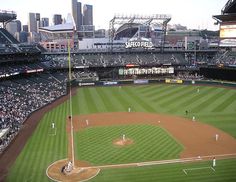 a baseball stadium filled with lots of people