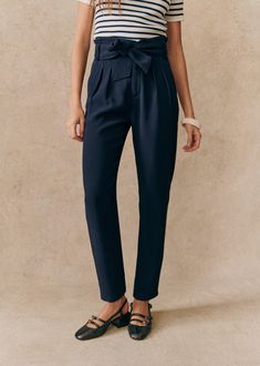 High waisted ankle length trousers;Belted paperbag cut;Stitched pleats at the waist;Zip and hook closure on the front;Italian pockets and piped back pocket;Inside leg length 72 cm / 28.5 in (all sizes) Tomboy Shirts, Paperbag Hose, Work Capsule, Winter Shopping, Smart Casual Outfit, Union Made, Marine Blue, Business Outfit, Embroidered Denim