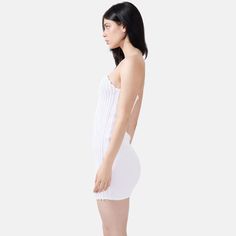 Introducing the Mycel Rib Knit Mini Dress in White—a true blend of elegance and edge. Handcrafted pleating enhances a curvaceous fit, making this dress both flattering and playful. Perfect for special occasions or when you want to make an unforgettable entrance, its luxe heavyweight rib knit offers warmth, breathability, and a beautifully structured drape. Sustainably made in Australia, this standout piece is designed for women who value timeless style with a touch of daring charm Slip on 80% Ac Elegant Ribbed Mini Length Dress, Ribbed Fitted Evening Dress, Fitted Ribbed Evening Dress, Elegant Ribbed Summer Dress, Fitted Ribbed Dress For Date Night, Ribbed Fitted Mini Dress, Fitted Pleated Dress For Date Night, April Birthstone Jewelry, March Birthstone Jewelry