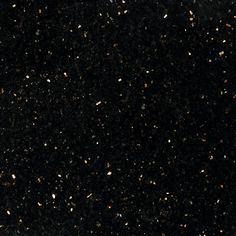 black and gold speckled background with white dots