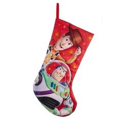 the toy story christmas stocking is hanging from a red ribbon with woody and buzz on it