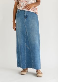 Let us introduce you to the denim skirt you'll want to wear with everything, the Lee A-Line Raw Hem Maxi Skirt! This stunning maxi denim skirt is an Inherit Design made in the USA! Crafted from high quality, stretchy, medium wash denim that is super soft and will keep you comfortable all day long. The A-line fit is walkable, modest, and on-trend with a raw hem. This sustainable, modest, American-crafted skirt is a true seasonless staple you will wear for years to come! Style | Midi, Denim Color Full-length Denim Blue Maxi Skirt, Relaxed Full Length Denim Skirt In Medium Wash, Medium Wash Full Length Relaxed Denim Skirt, Medium Wash Denim Maxi Skirt, Medium Wash Straight Leg Denim Maxi Skirt, Medium Wash Denim Maxi Skirt Straight Leg, Casual Summer Maxi Skirt With Frayed Hem, Full-length Denim Skirt With Frayed Hem, Full Length Denim Skirt With Frayed Hem