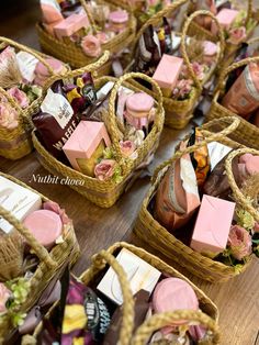 baskets filled with different types of soaps on top of a wooden table next to each other