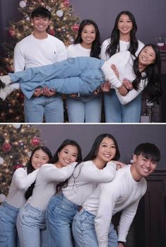 four people posing in front of a christmas tree with their arms wrapped around each other