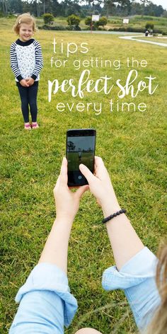 a person holding up a cell phone in the grass with text overlay that reads tips for getting the perfect shot every time