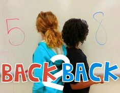 two children standing in front of a whiteboard with the words back to school written on it