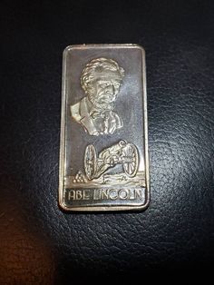 a silver bar with an image of abraham lincoln on it