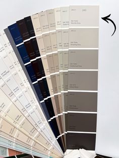 the swatches for different shades of paint are arranged on top of each other,