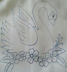 an embroidered swan with flowers on it's chest